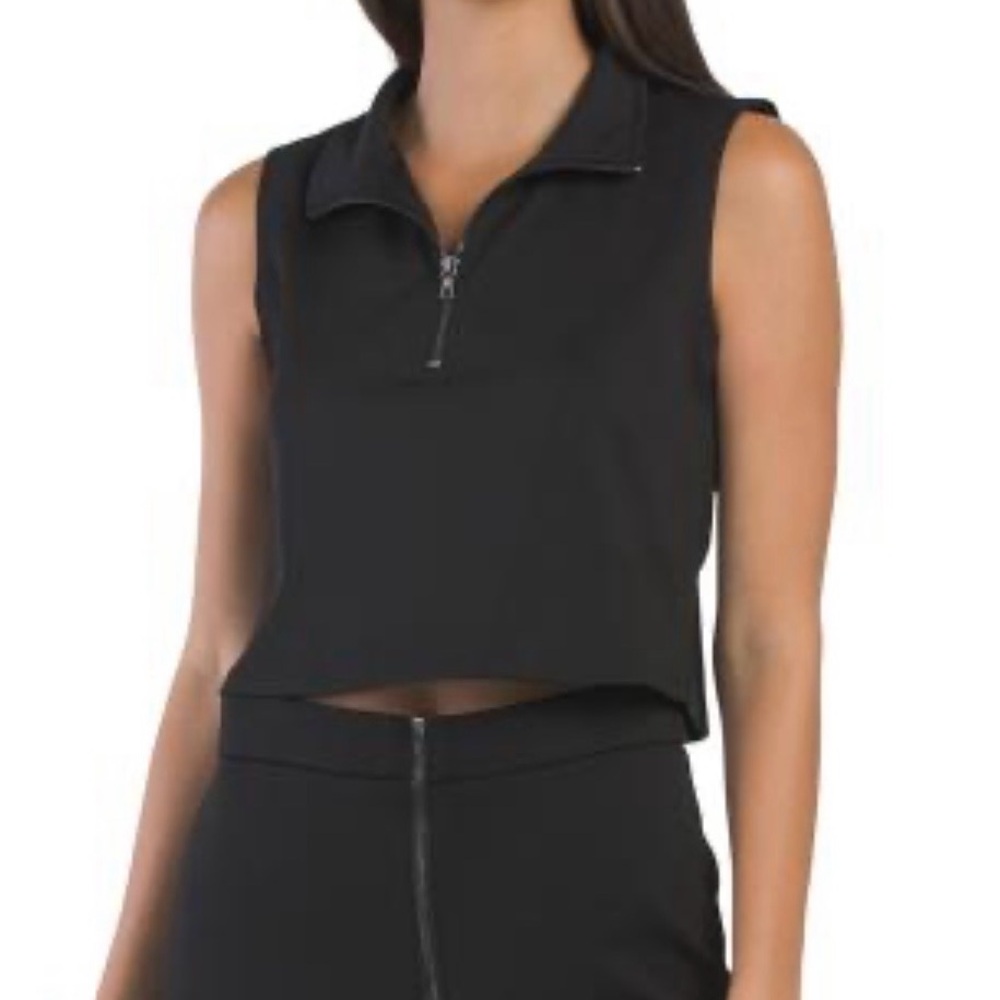 KENNETH COLE
sleeveless mock neck top with zipper